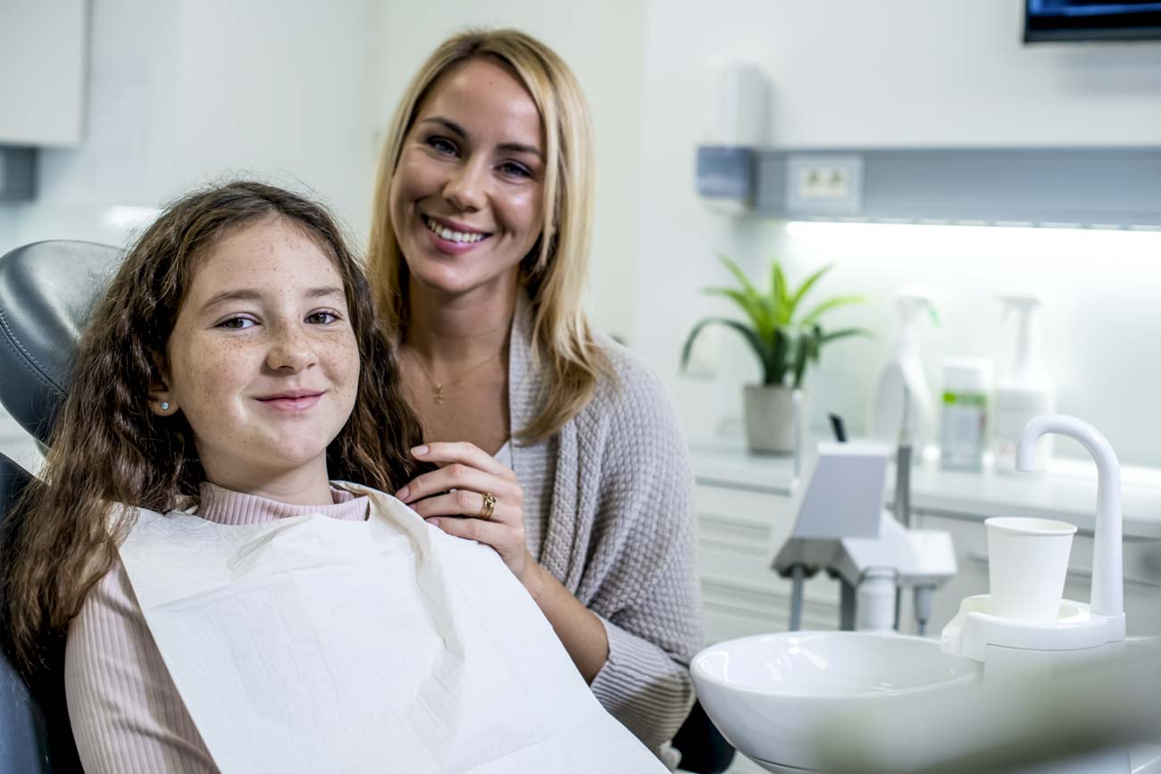 family in dental office